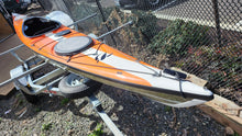 Load image into Gallery viewer, Stellar Nomad multis port performance touring kayak orange white stern
