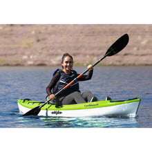 Load image into Gallery viewer, Woman paddling an Eddyline Caribbean 10 recreational kayak.
